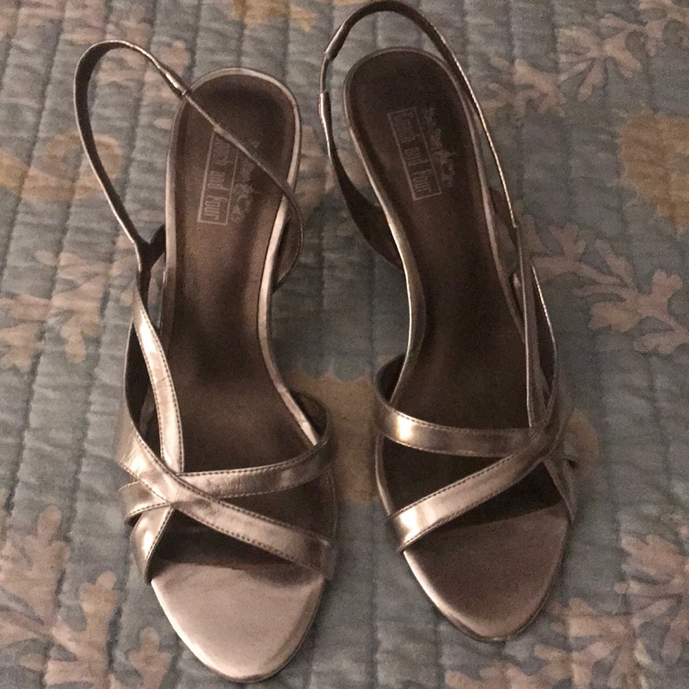 Silver heels by coach and four